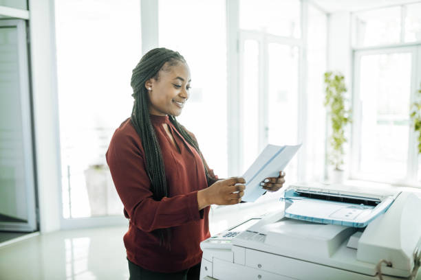 Woman using a photocopier