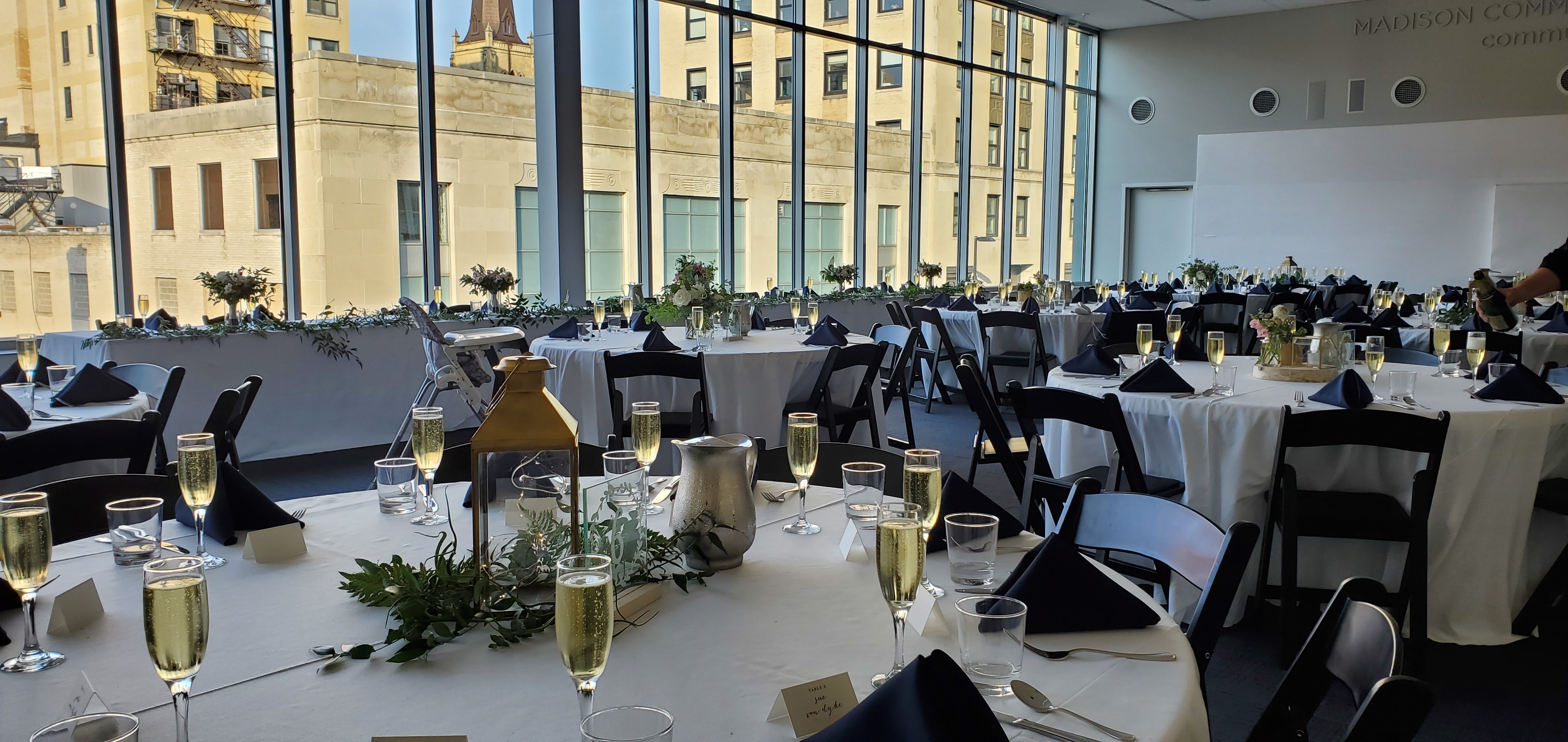 Community Room set for a reception with round tables