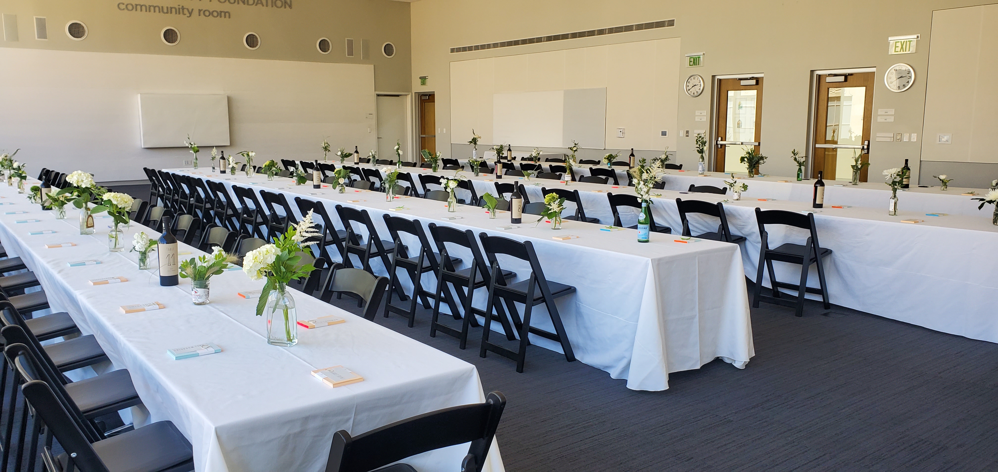 wedding banquet set with three rows of tables