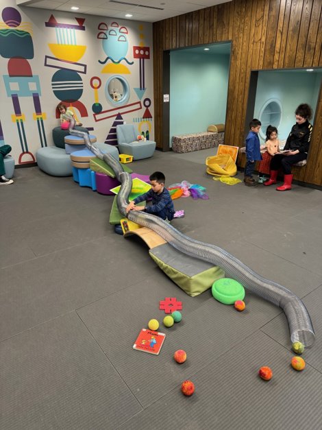 Youth playing at Pinney Library