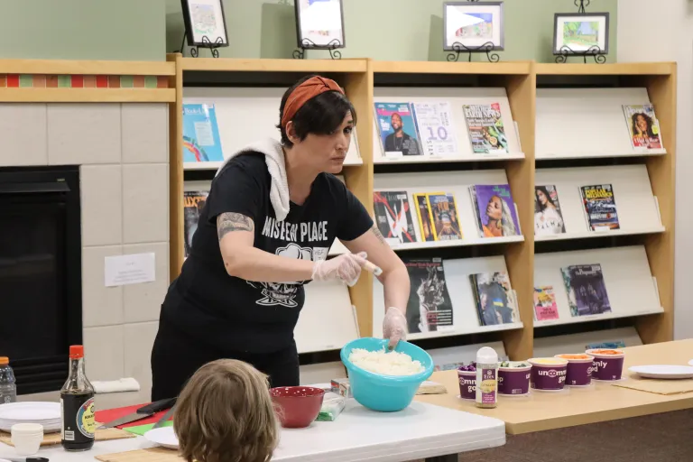 Chef Lily teaching a cooking class